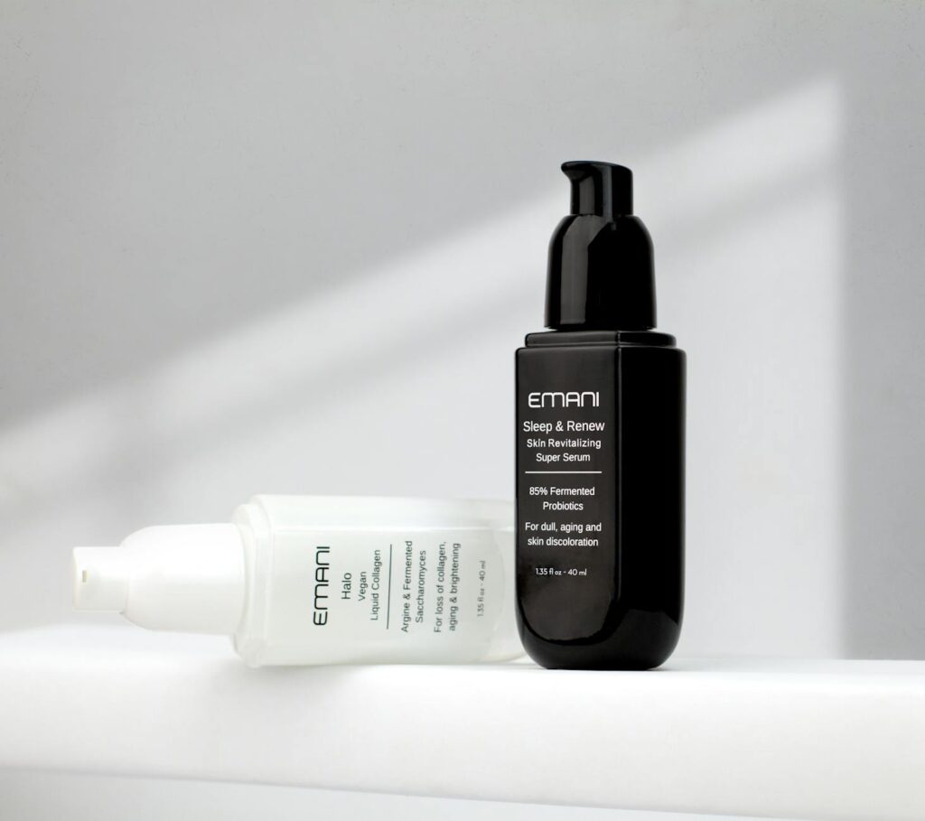 Studio shot of Emani skincare serums on a white background showcasing luxury bea